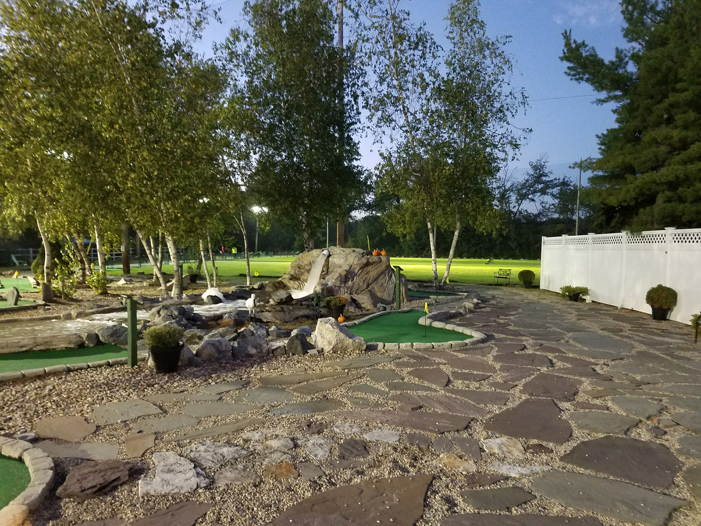 Mini golf stone path at dusk